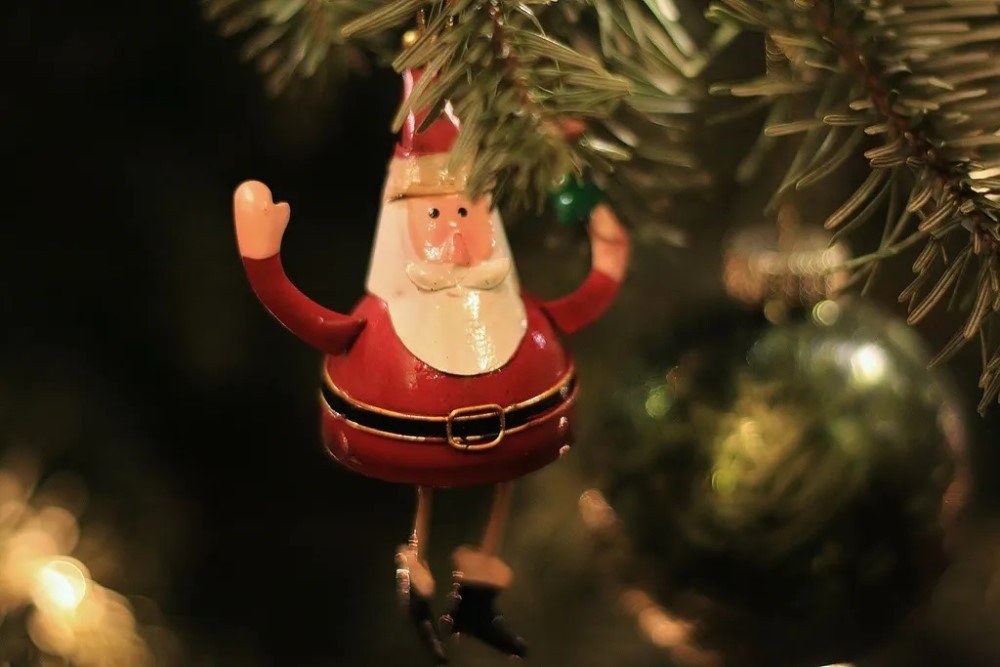 photograph of Santa Claus ornament on tree