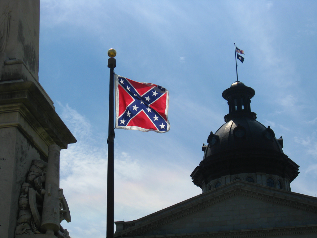 A photo of a confederate flag flying over Columbia, South Carolina