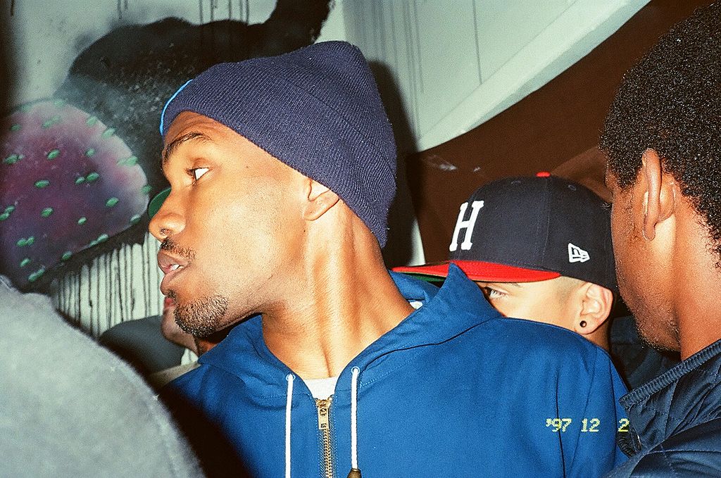 A snapshot of Frank Ocean in a crowd.