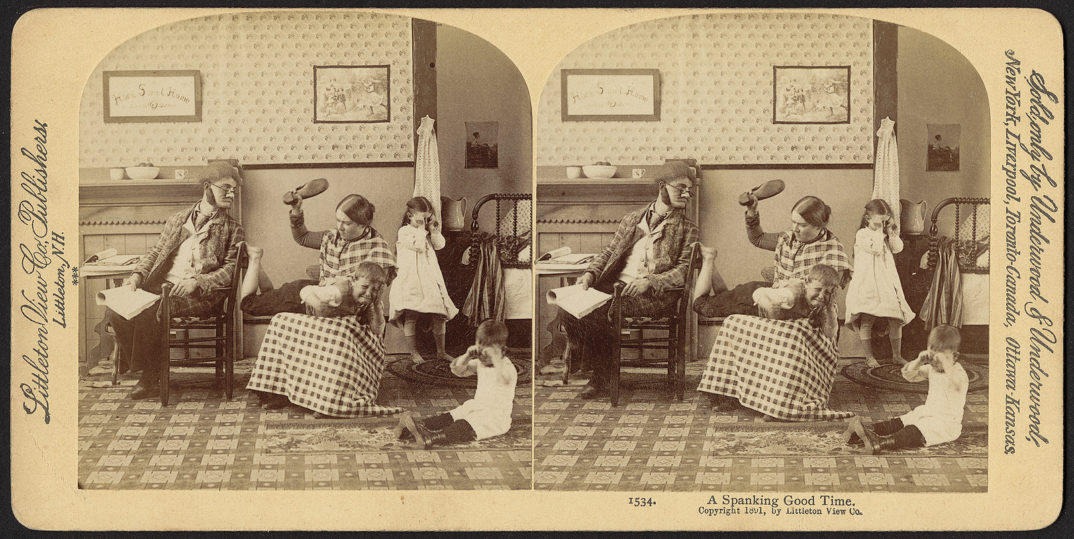 A stereograph of a woman spanking her child.