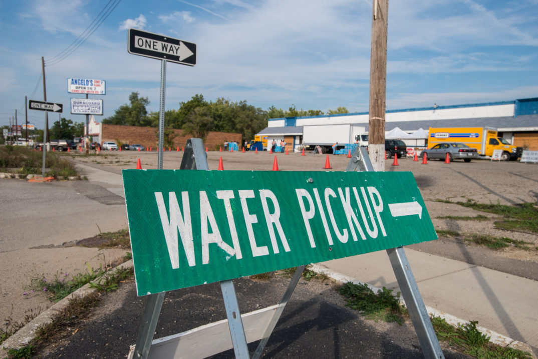 Photograph of "Water Pickup" sign in Flint, Michigan