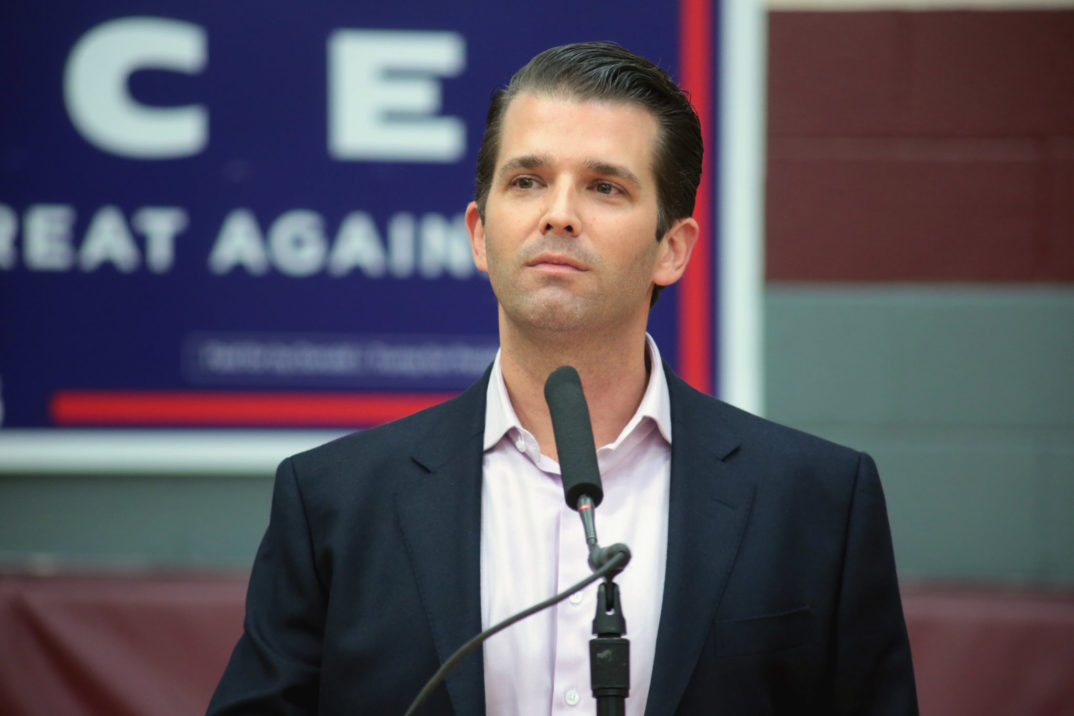 portrait of Donald Trump Jr. at a campaign event