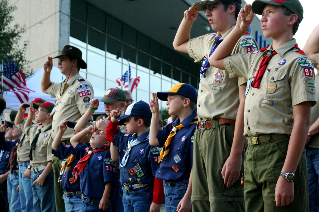 Photo of Boy Scouts saluting.
