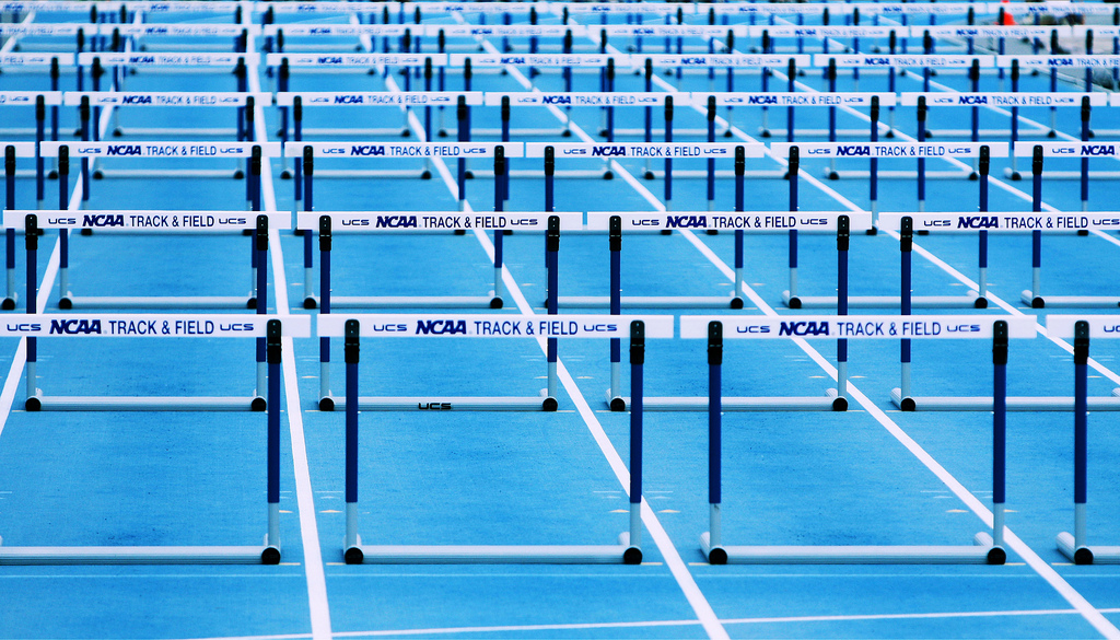 Image of hurdles on a track.