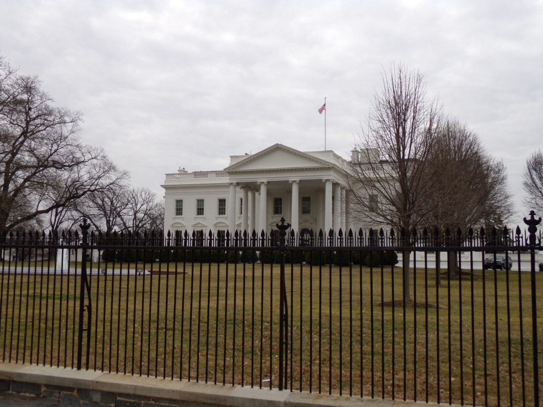 Photograph of the White House and the fence that surrounds it