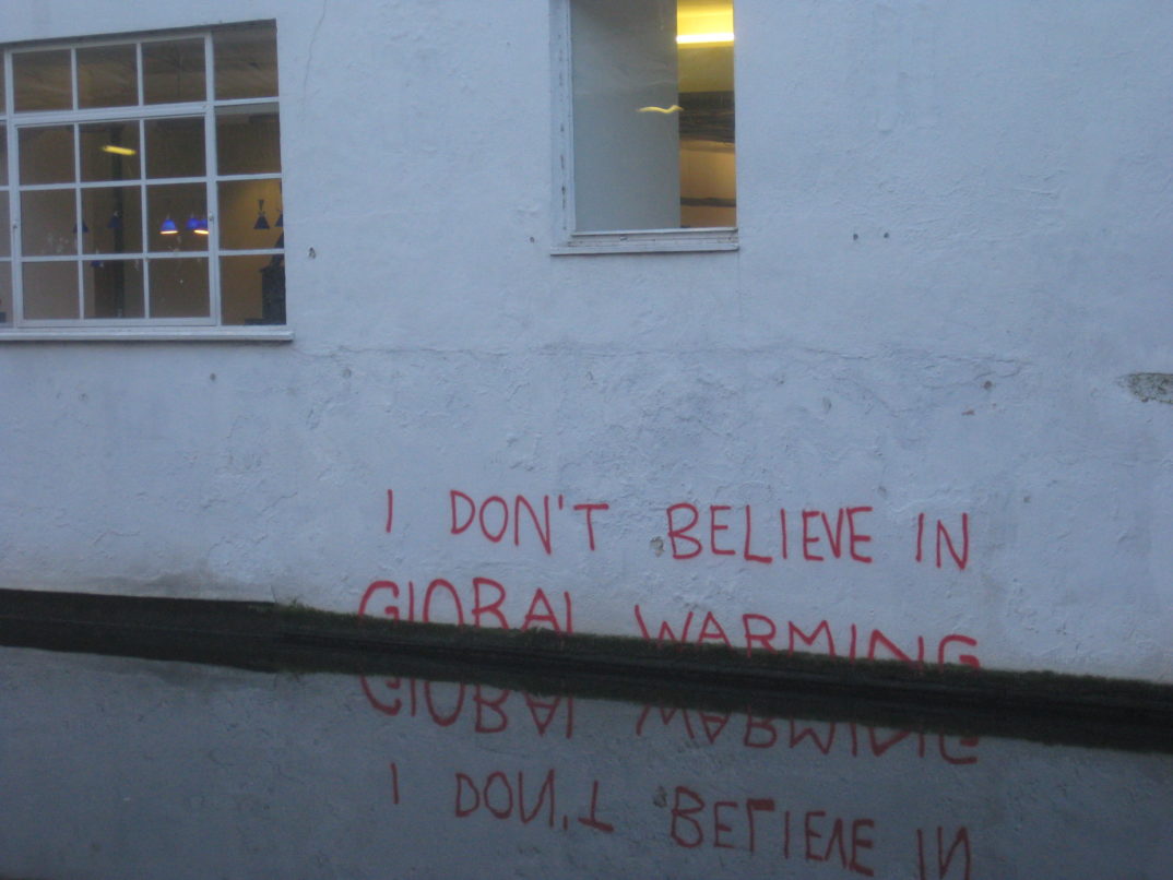 "Banksy is a climate change denier" by Matt Brown licensed under CC BY 2.0 (via Flickr).