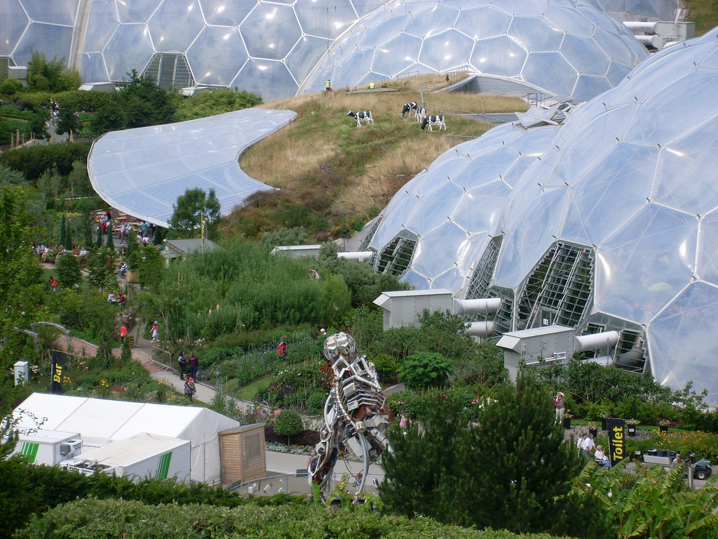 Photograph of people touring glass biospheres