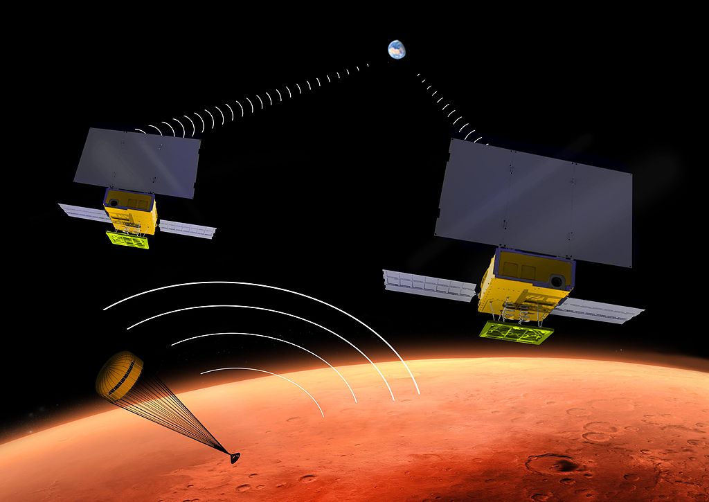 Artist's rendering of InSight and the two MarsCubes as they approach Mars from Earth