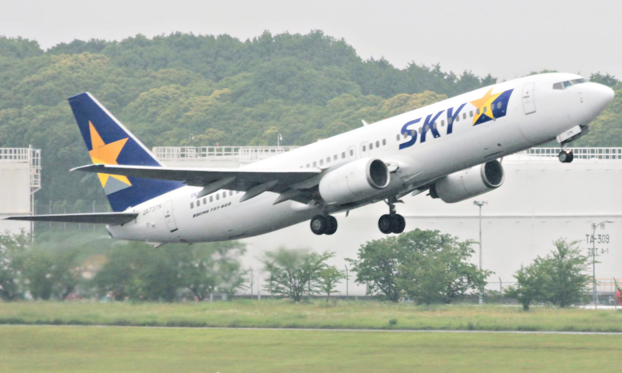 Photograph of a Sky airplane taking off