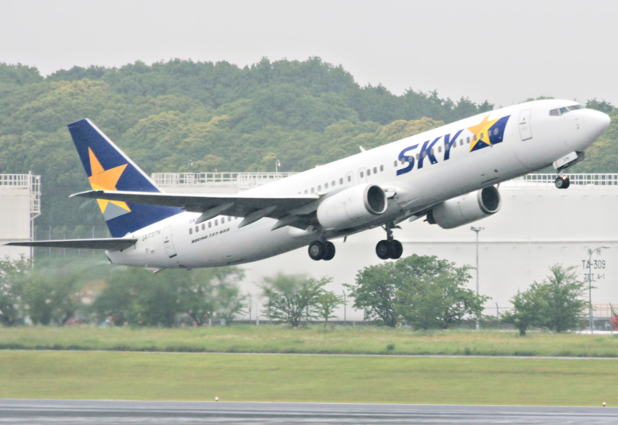 Photograph of a Sky airplane taking off