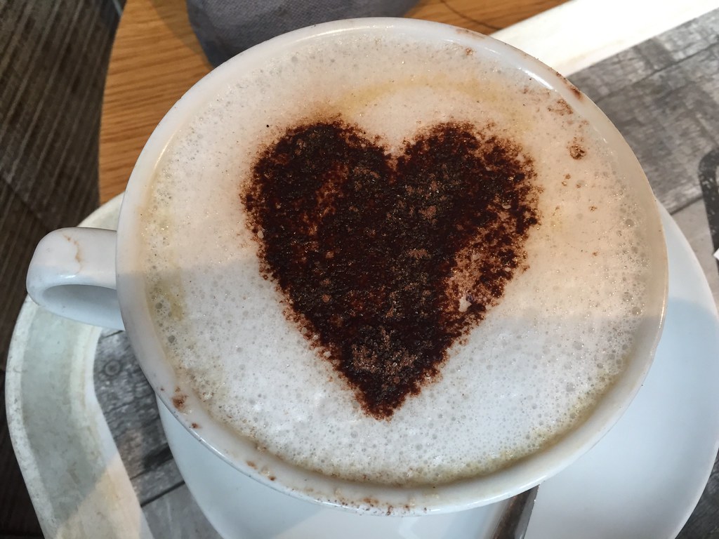 photograph of cappuccino with heart made with foam