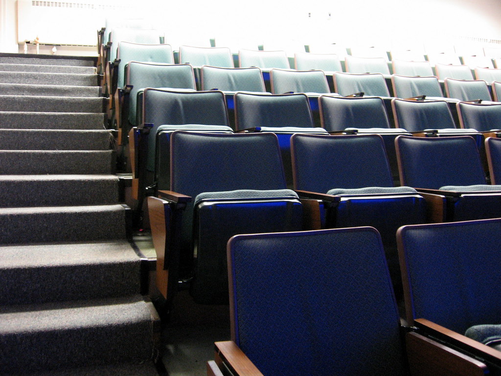 Photograph of empty seats in university lecture hall