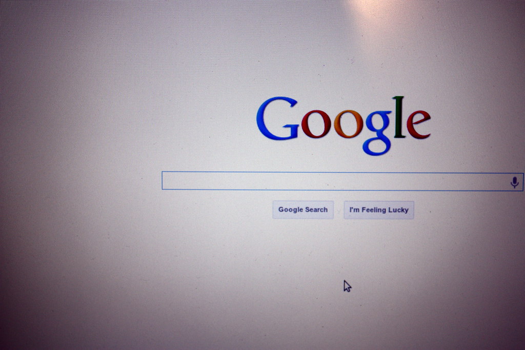 photograph of computer screen with empty Google searchbar