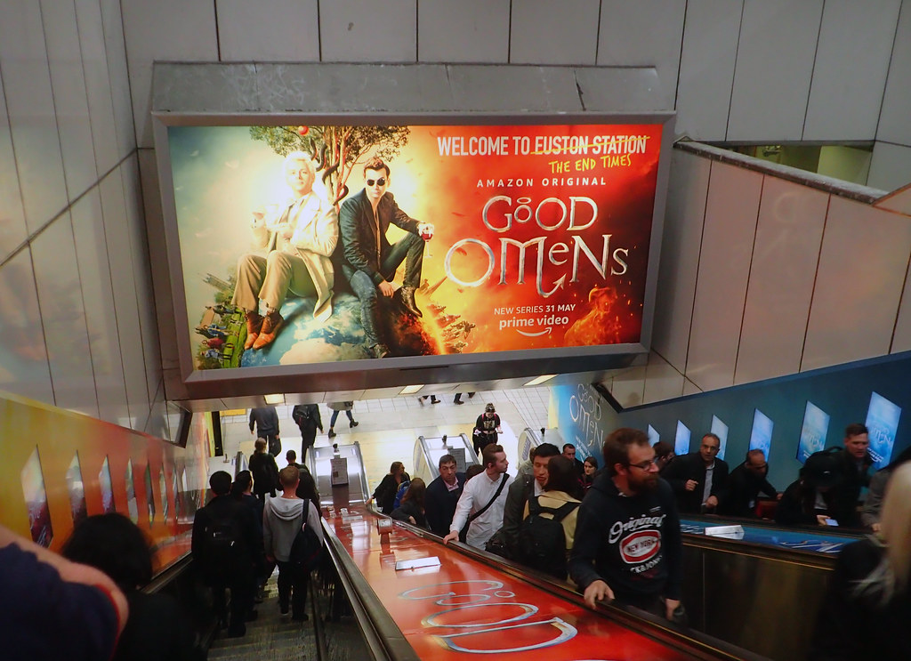 photograph of Good Omens advertisement on escalator