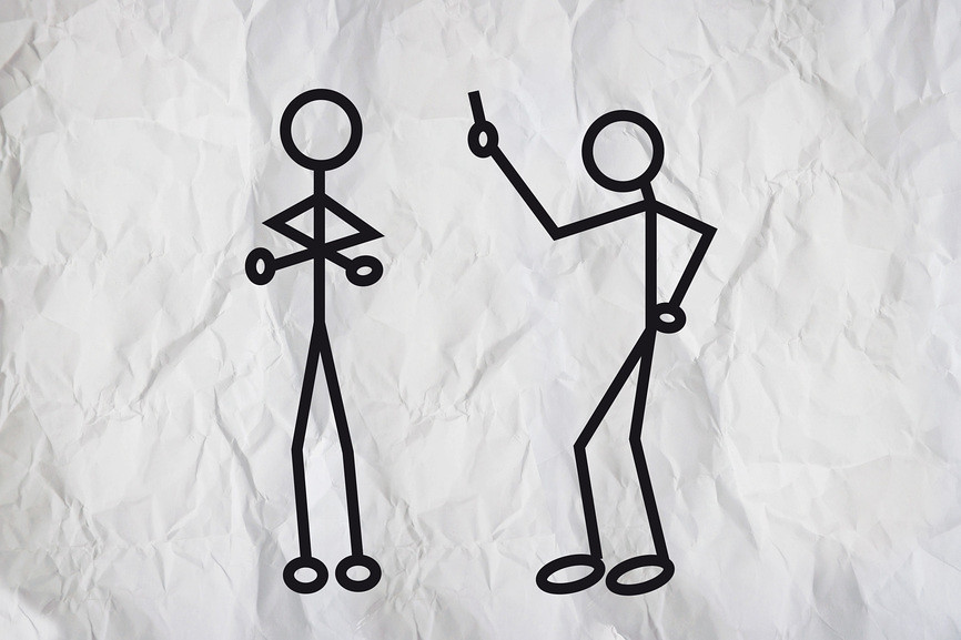 Image of two human stick-figures arguing