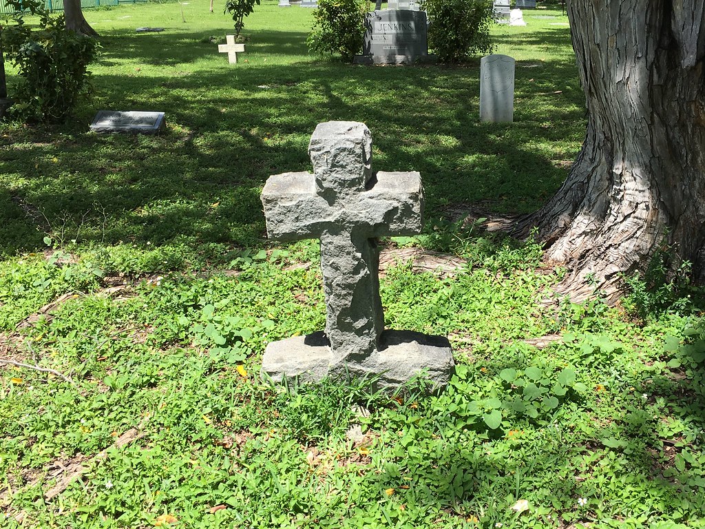 photograph of unmarked headstone in cemetery