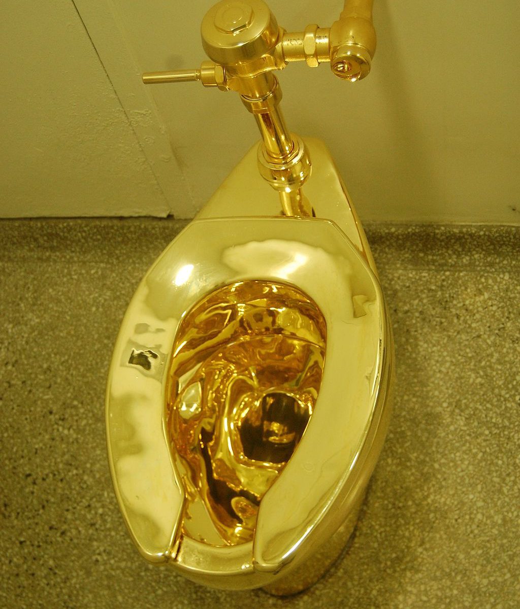 photograph of solid gold toilet America