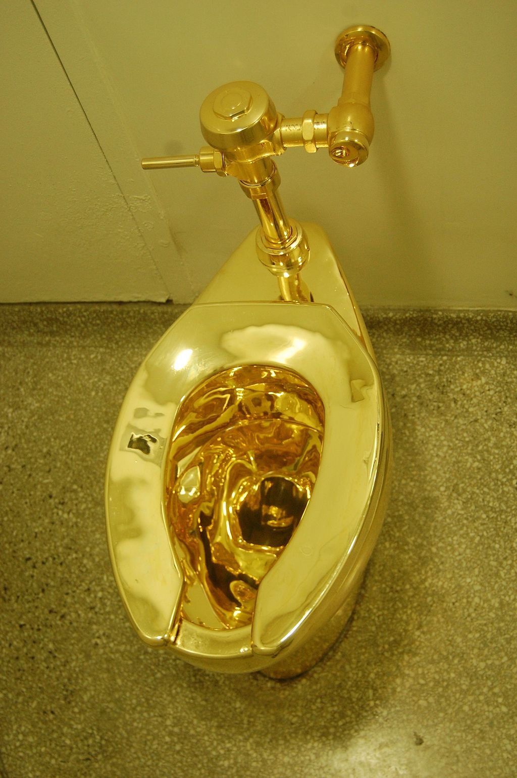 photograph of solid gold toilet America