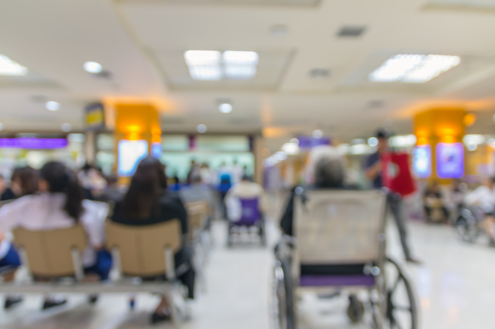 blurred photograph of crowded hospital waiting room