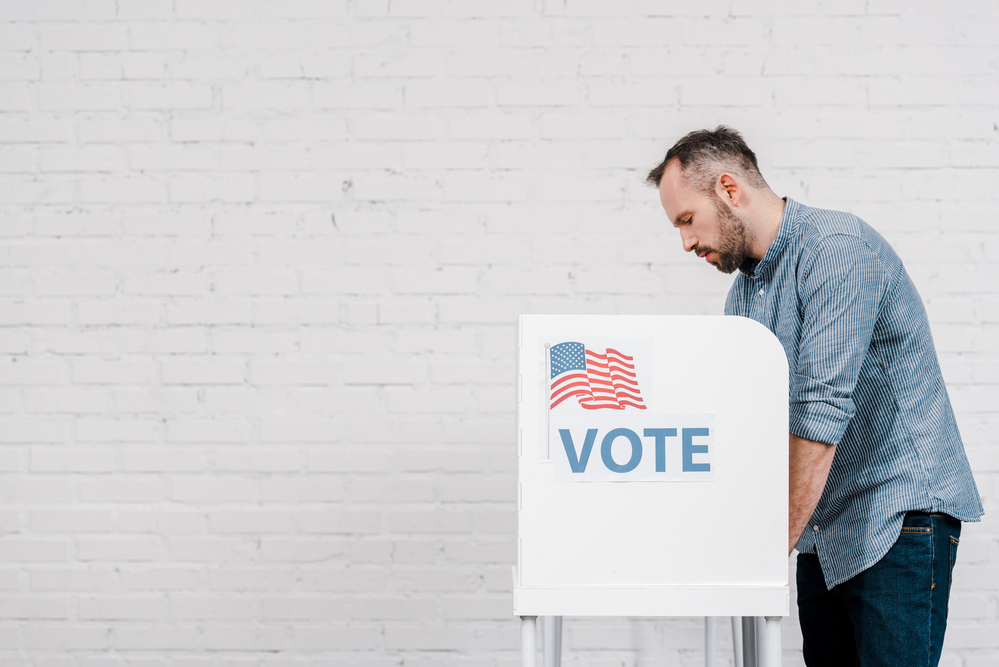 photograph of voter filling out ballot