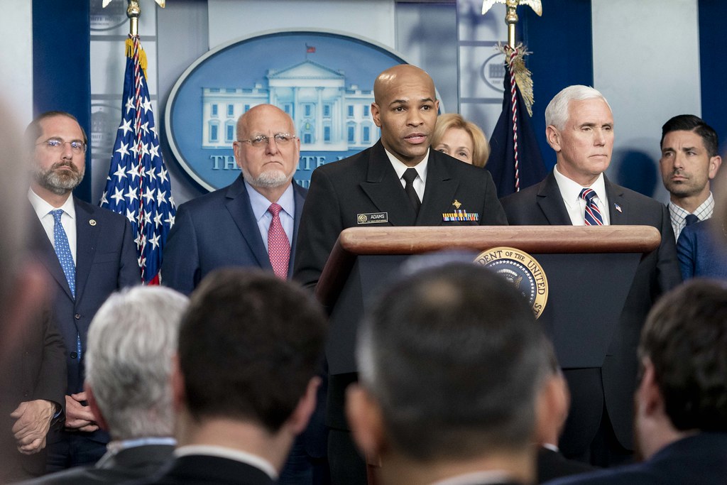 photograph of Surgeon General Adams at podium during coronavirus briefing