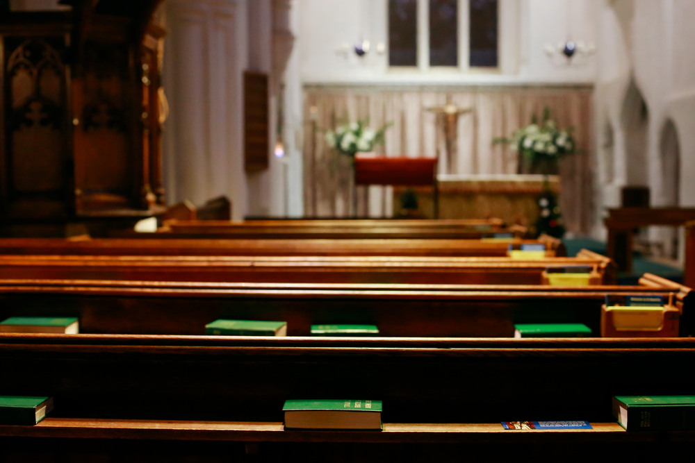 photograph of empty church pews