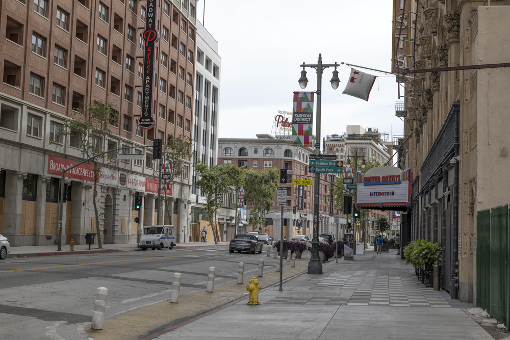 photograph of boarded up business in downtown LA