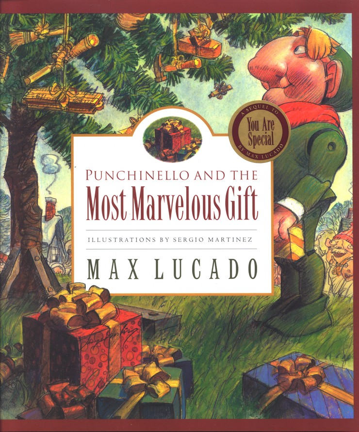 Illustrated book for Punchinello and the Most Marvelous Gift cover featuring a wooden puppet-man in a green outfit standing near a tree festooned with wooden toys. Beautifully wrapped boxes of presents are arranged on the ground in front of the tree.