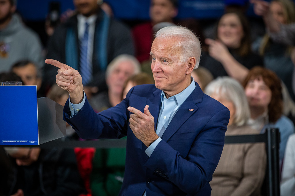 photograph of Biden at rally pointing to the crowd