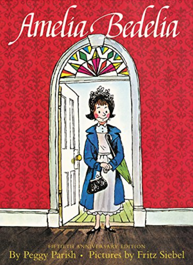 Illustrated book cover for Amelia Bedlia of a white woman with brown hair wearing a flower headpiece, a maid's uniform and a blue coat. She's standing in the arched doorway of a room with red wallpaper on the walls.