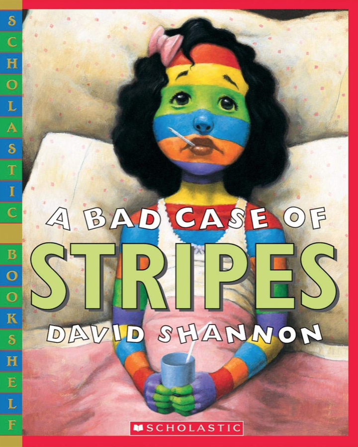 Illustrated book cover for A Bad Case of the Stripes featuring a little girl with black hair looking sad as she sits up in bed amongst a bunch of pillows. She has a thermometer in her mouth and a glass in her hands. She's also covered in a rainbow of stripes!