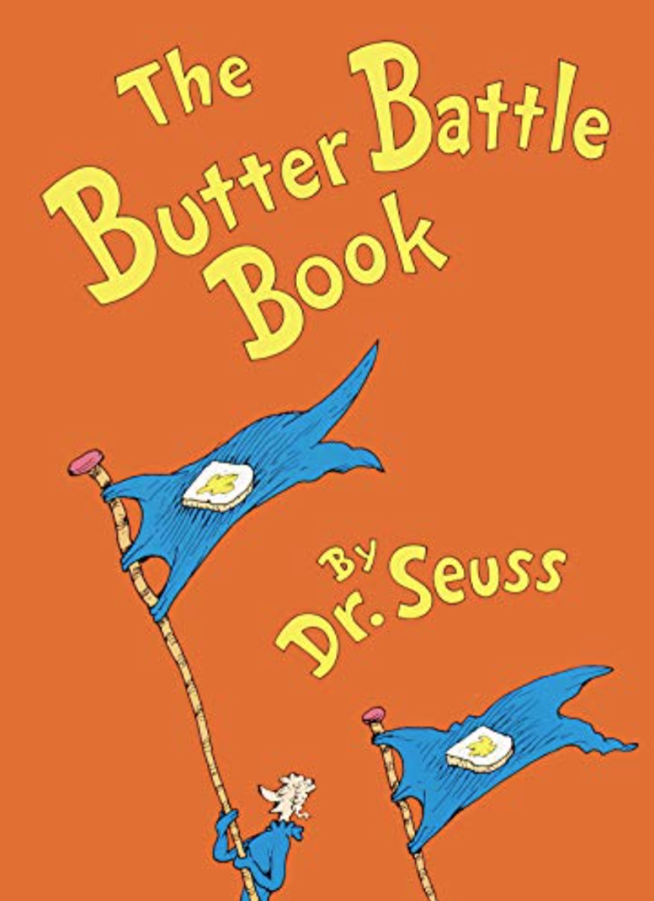 Illustrated book cover for The Butter Battle Book featuring an image of a poodle-like creature holding a flag with a piece of buttered toast on it
