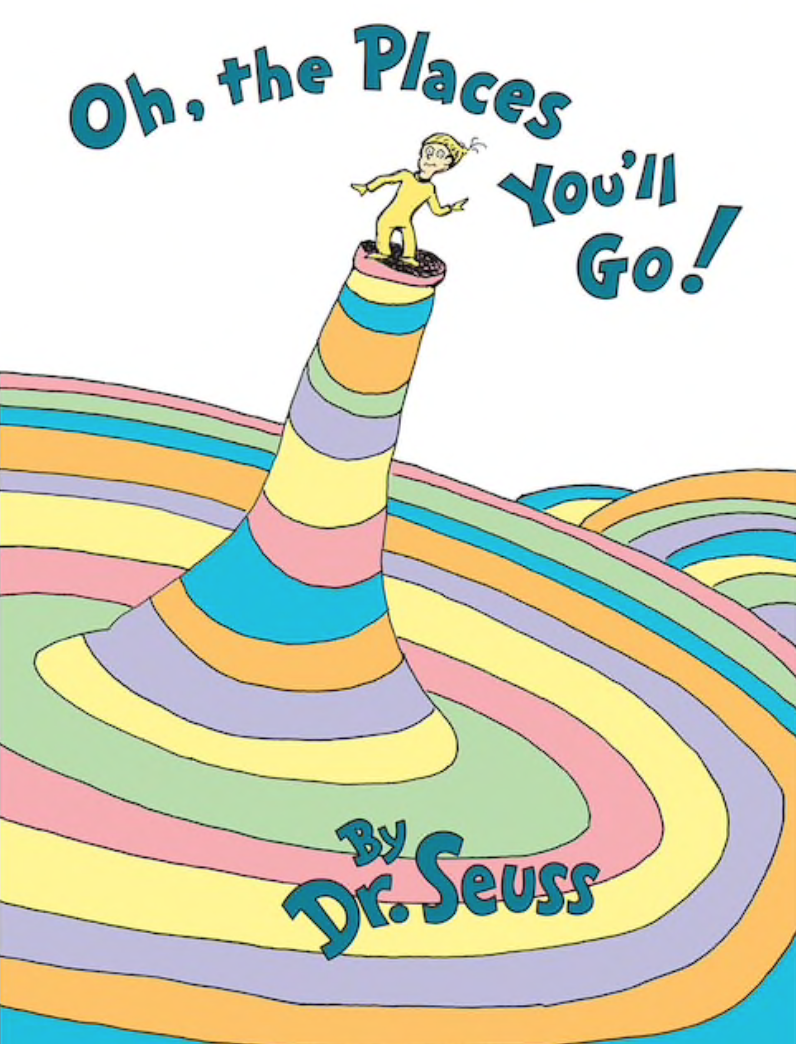 Illustrated book cover for Oh, the Places You'll Go! featuring a little boy standing atop a cone-like hill. He has light skin, is wearing yellow pajamas, and looks uncertain. The hill is steep and has bright bands of color. Two more hills are visible in the background.
