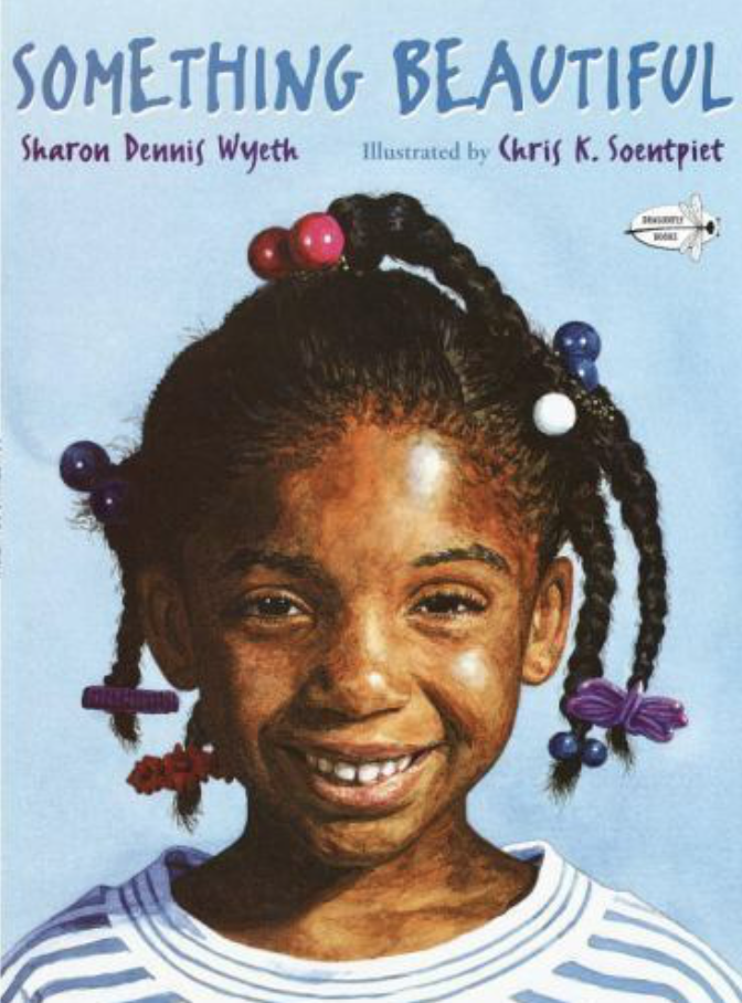 Illustrated book cover for Something Beautiful featuring a young Black girl's head and shoulders. She is smiling and wearing a blue and white striped shirt. She has dark braids with colorful beads on them.