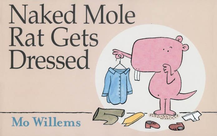 Cover image for Naked Mole Rat Gets Dressed featuring a cartoon illustration of a naked mole rat holding up a shirt on a hanger and looking at it with a quizzical or worried expression. The mole rat has shoes and pants on the ground in front of it.