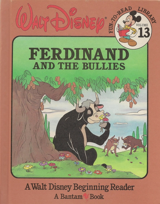 Illustrated book cover for Ferdinand and the Bullies featuring a black bull smelling flowers under a tree. Two brown bulls in the background point and laugh at the black bull.