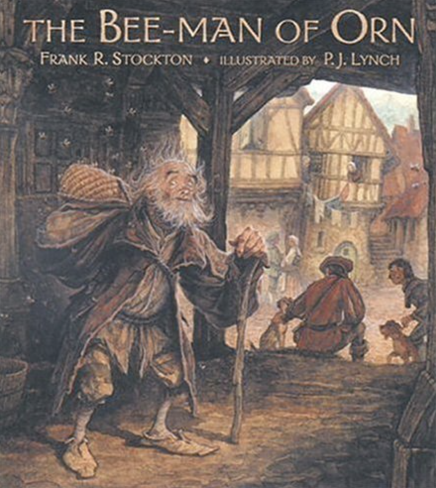 Illustrated book cover for The Bee-Man of Orn featuring a colorful drawing of a smiling man with a large red nose and old-fashioned looking clothes on. He's got a beehive in his hands and is about to place it on a table with another bee-hive. A jolly-looking pig sits under the table and looks up at the man.