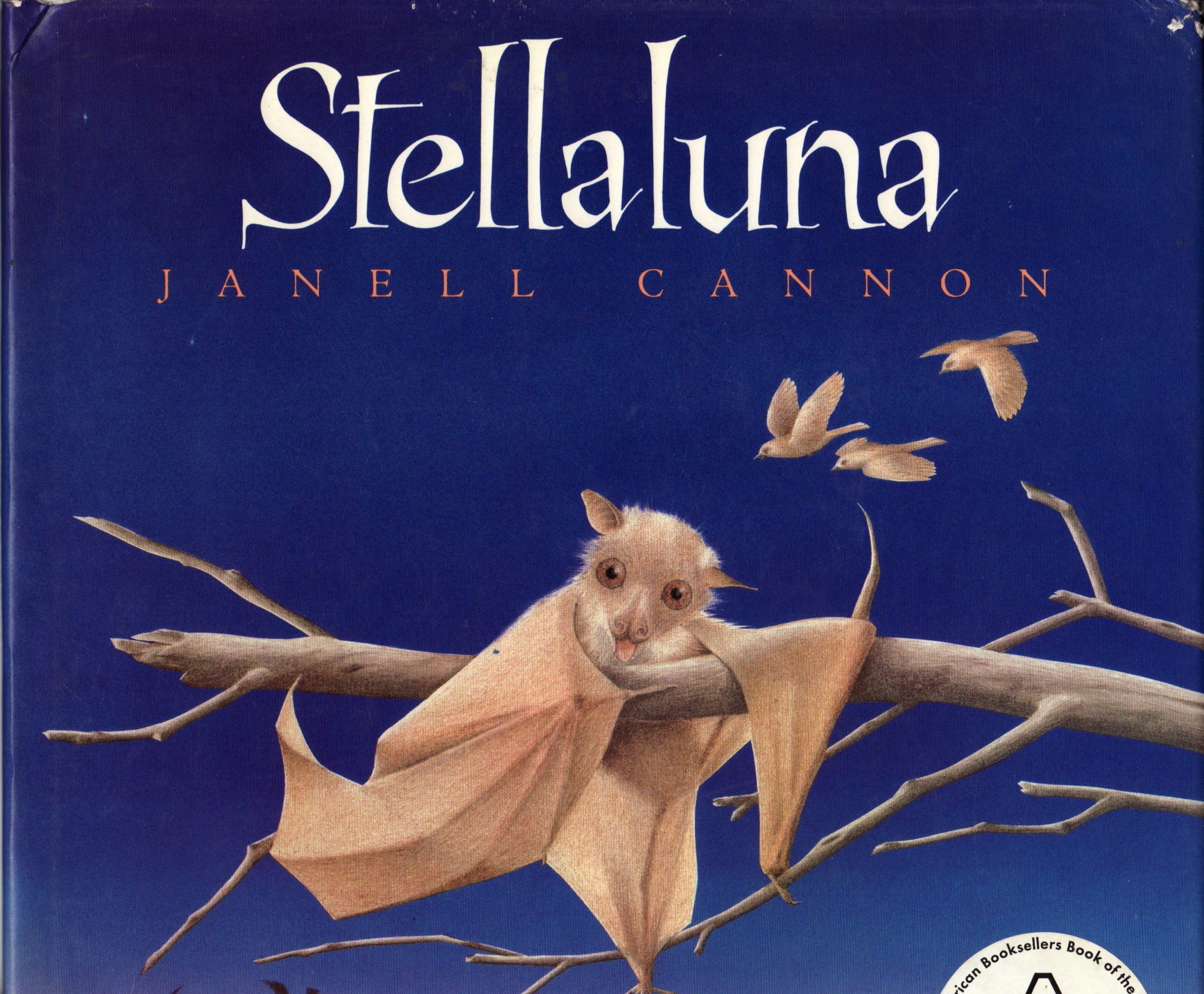 Cover image for Stellaluna with an illustrated of a small brown bat clinging to a tree branch. Three brown birds fly in the sky in the distance