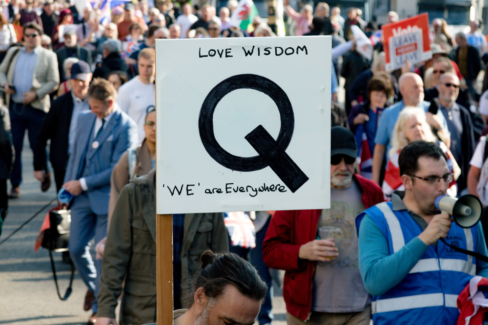 photograph of QAnon sign at rally