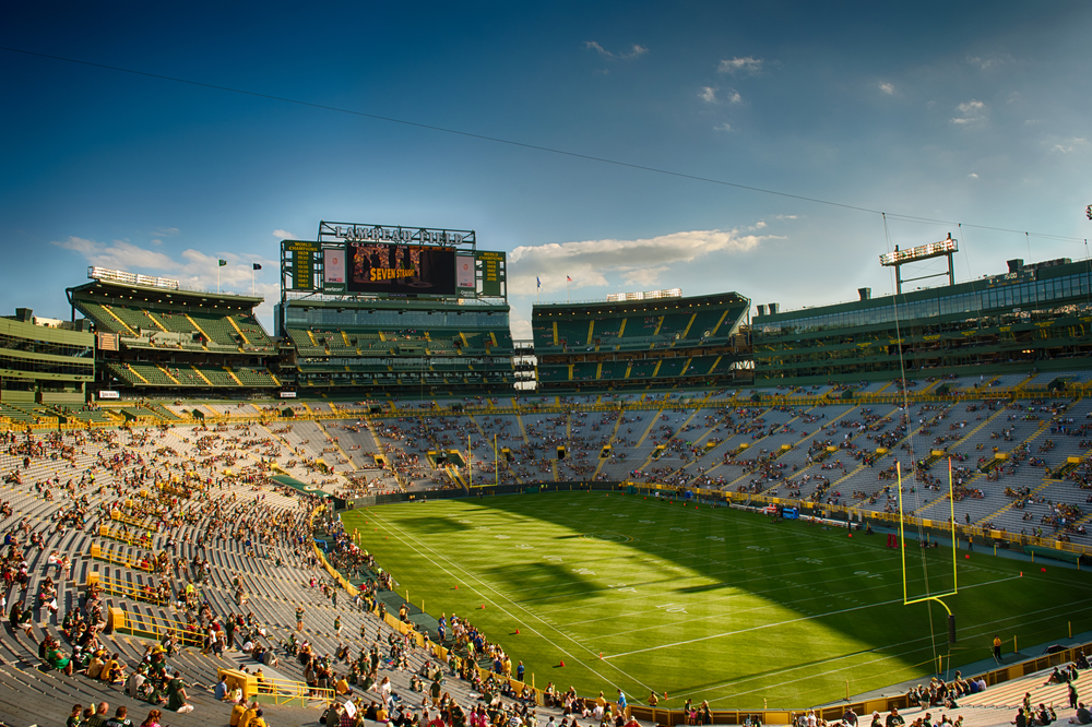 photograph of Green Bay Packers stadium lightly populated before game