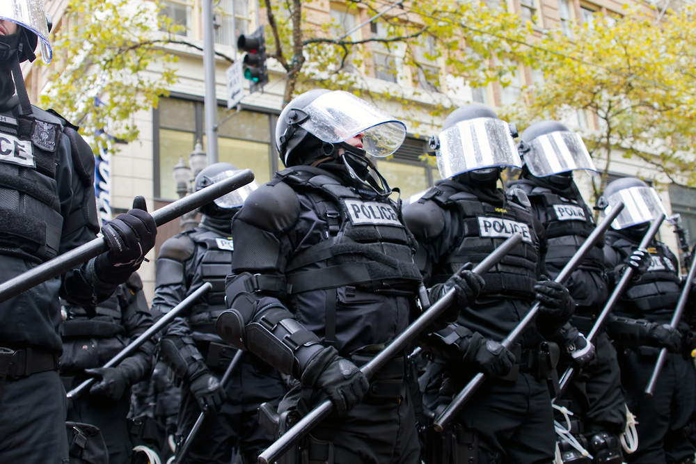 photograph of police in riot gear in Portland