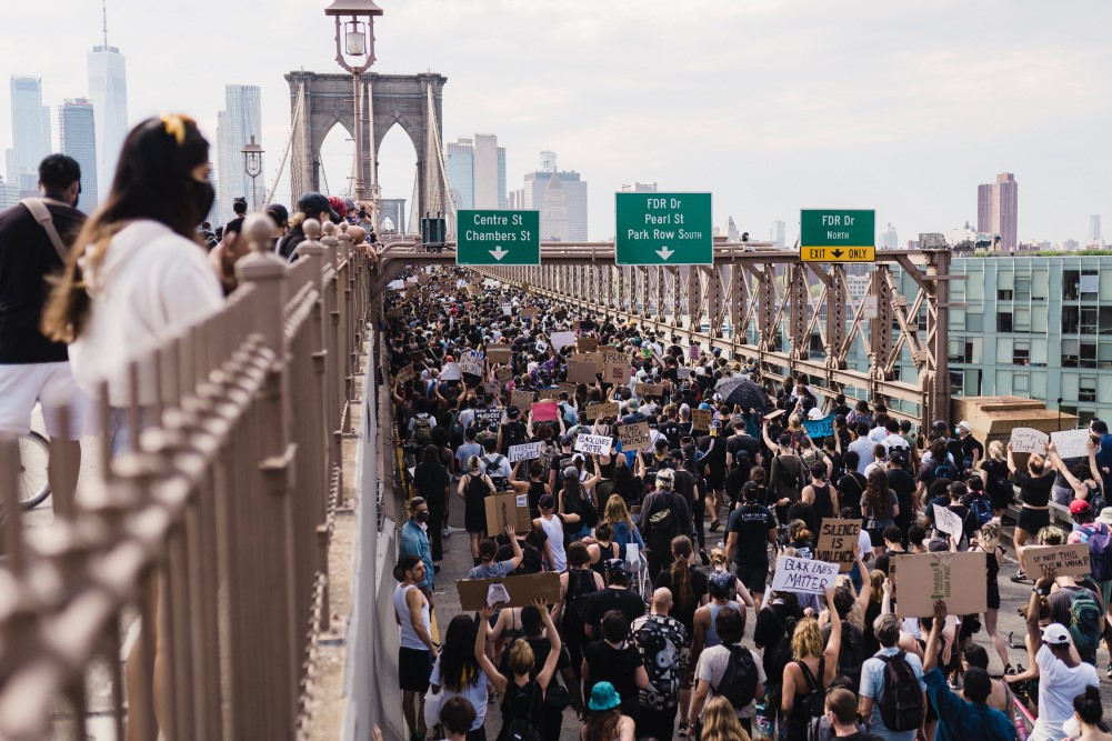 photograph of protesters occupying Brookyln Bridge