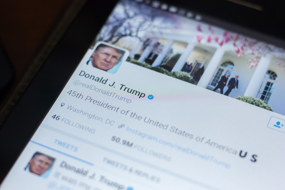 photograph of President Trump's twitter bio displayed on tablet