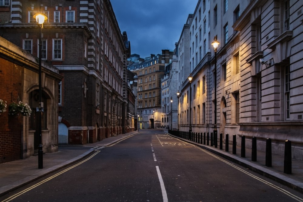 photograph of empty London street at night