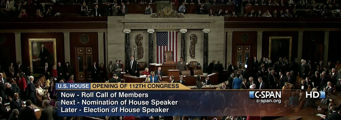 Photograph of a television screen showing the opening of the 112th Congress, as shown on C-SPAN
