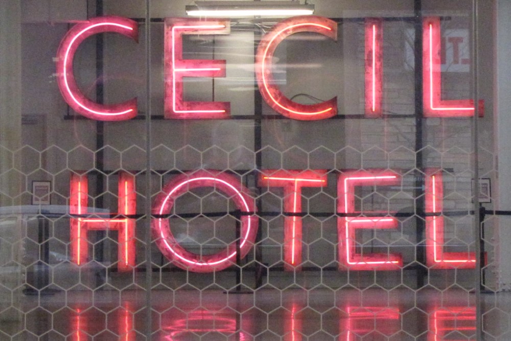 photograph of neon Cecil Hotel sign
