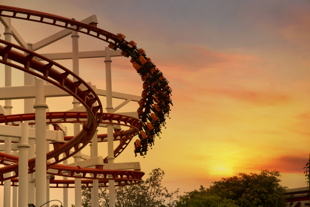 photograph of rollercoaster at dusk