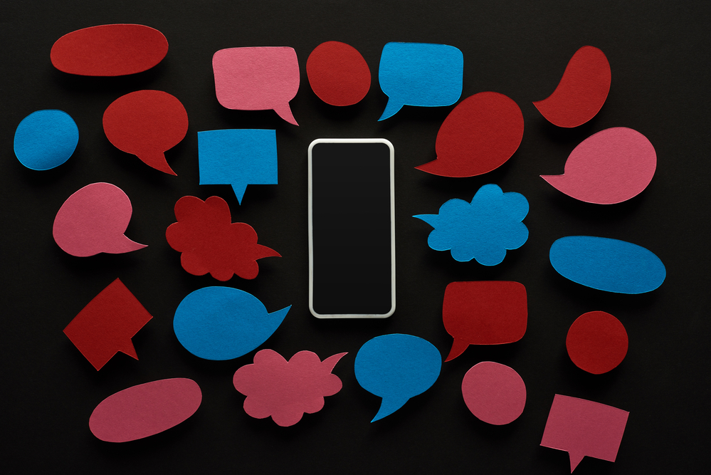 image of speech bubbles surrounding iphone outline