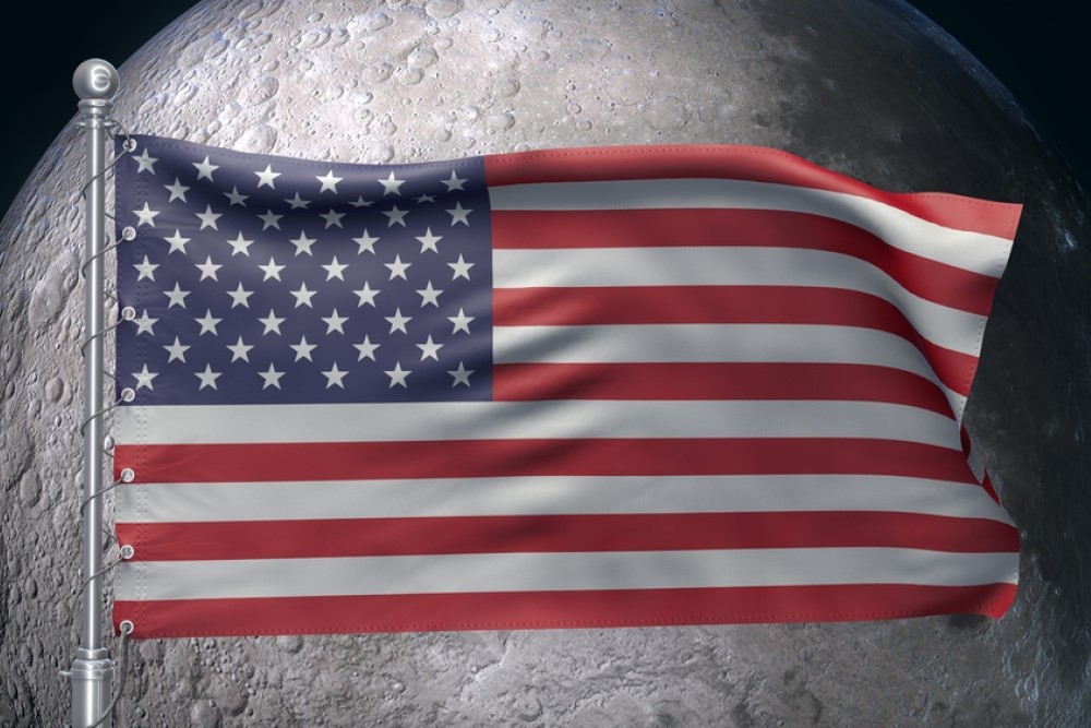image of American flag superimposed over the moon