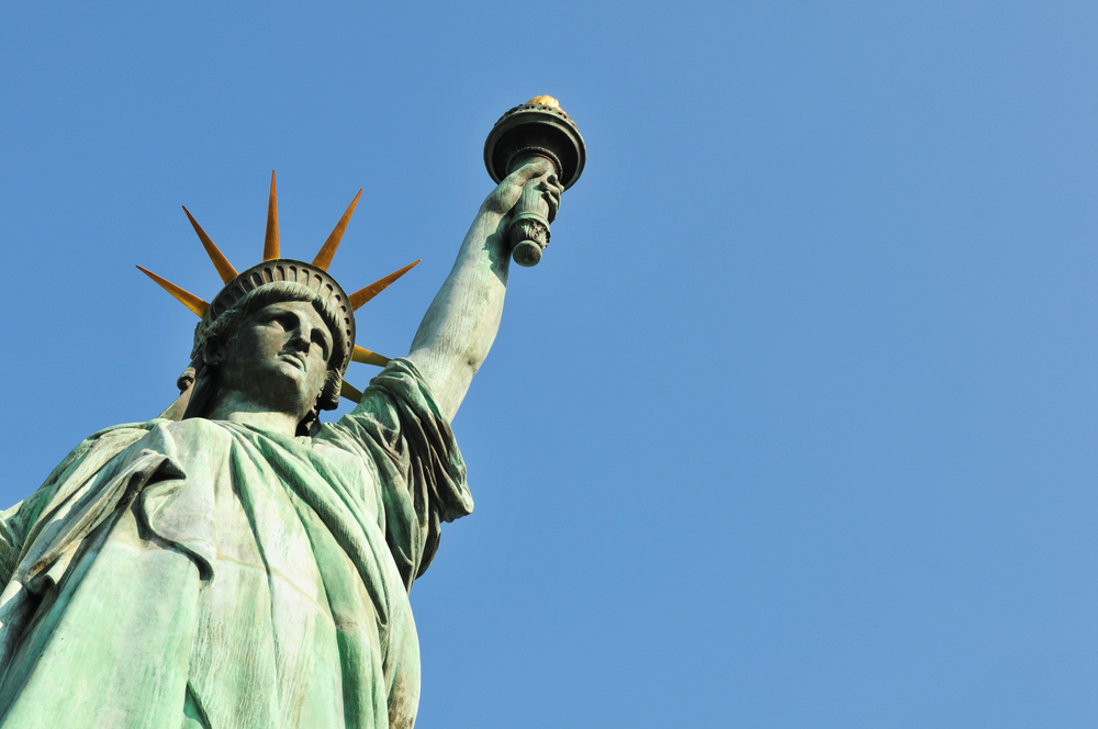 photograph looking up at Statue of Liberty